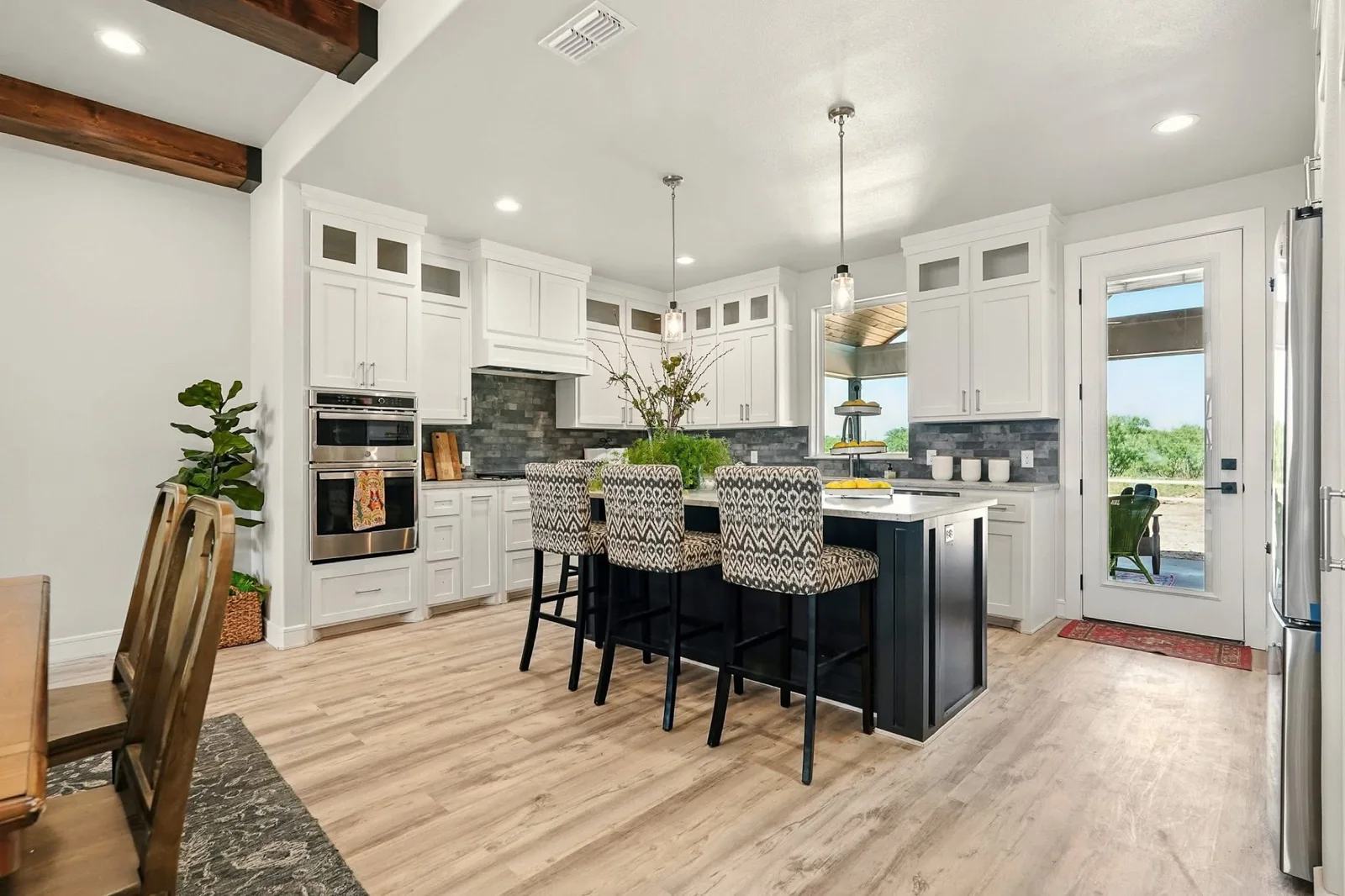 Blue and white kitchen with freshly painted cabinetry